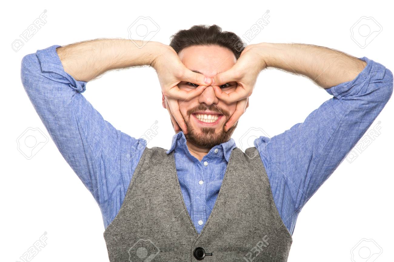 スタジオでポーズをとって面白いの若い男 の写真素材 画像素材 Image