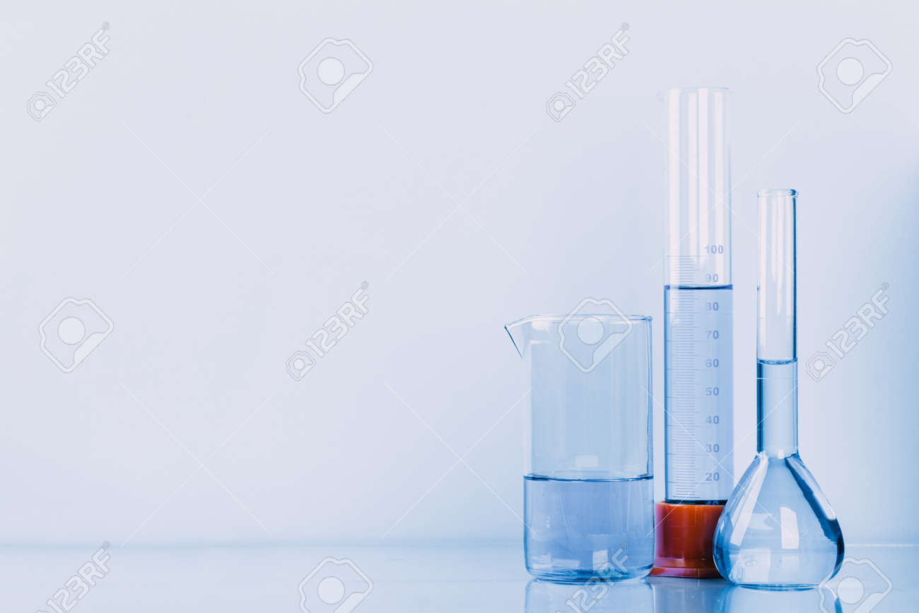 Laboratory glassware with a pipette and test tubes. scientific laboratory equipment - 146353725 Laboratory glassware with a pipette and test tubes. scientific laboratory equipment - 146353725
