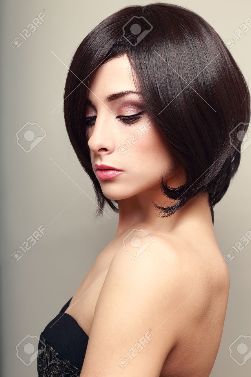 Beautiful Elegant Female Model With Black Short Hair Stock Photo
