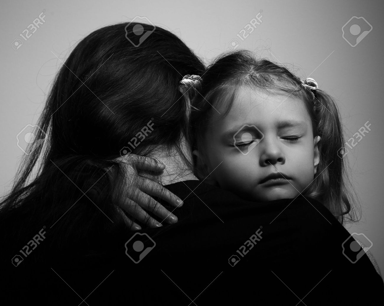 Depression Daughter Hugging Her Mother With Sad Face. Closeup Portrait Black And White Stock Photo, Picture and Royalty Free Image. Image 37348278.