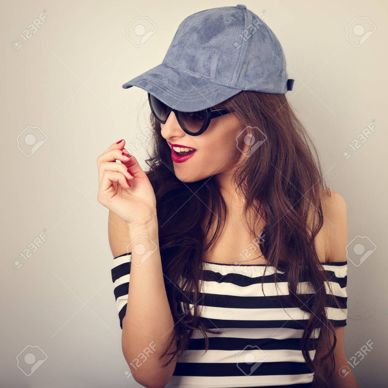 women in baseball hats