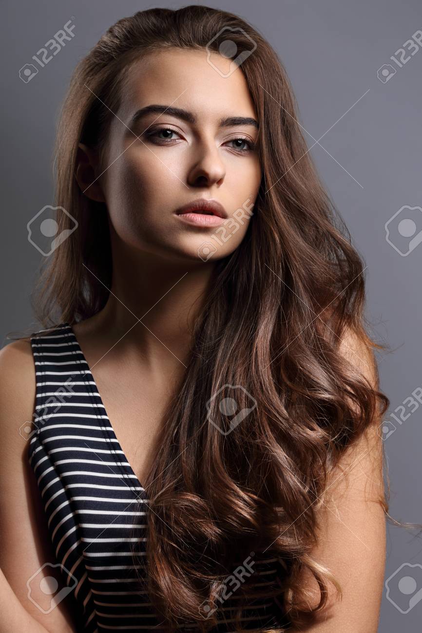Beautiful Calm Emotion Woman With Nude Natural Makeup And Long