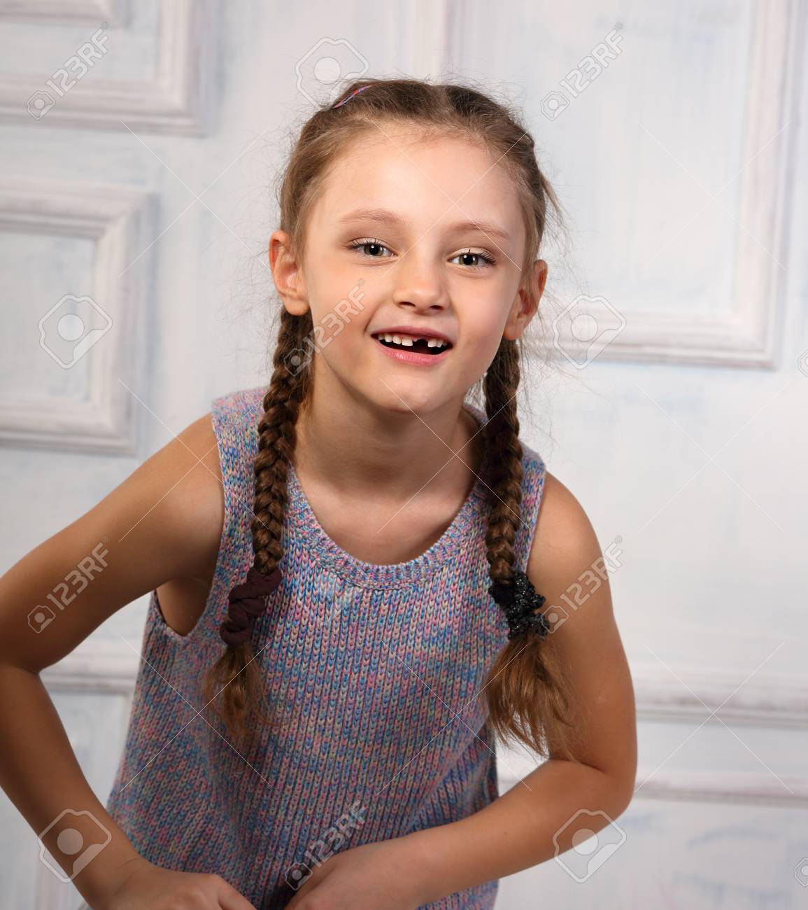 Fun Emotional Kid Girl Without Milk Tooth Posing In Fashion Blouse