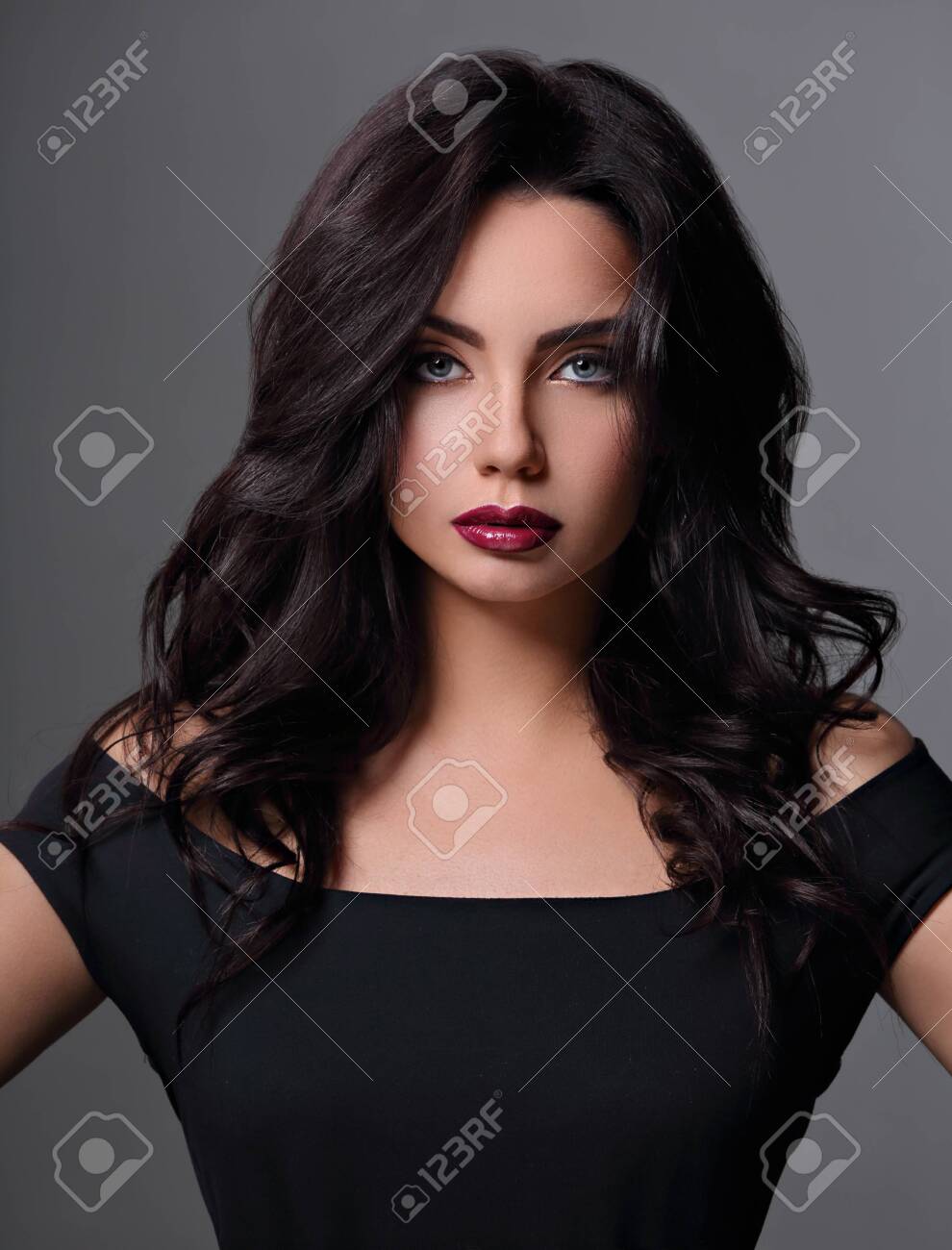 Beautiful Indian Bright Makeup Woman With Long Black Curly Hair