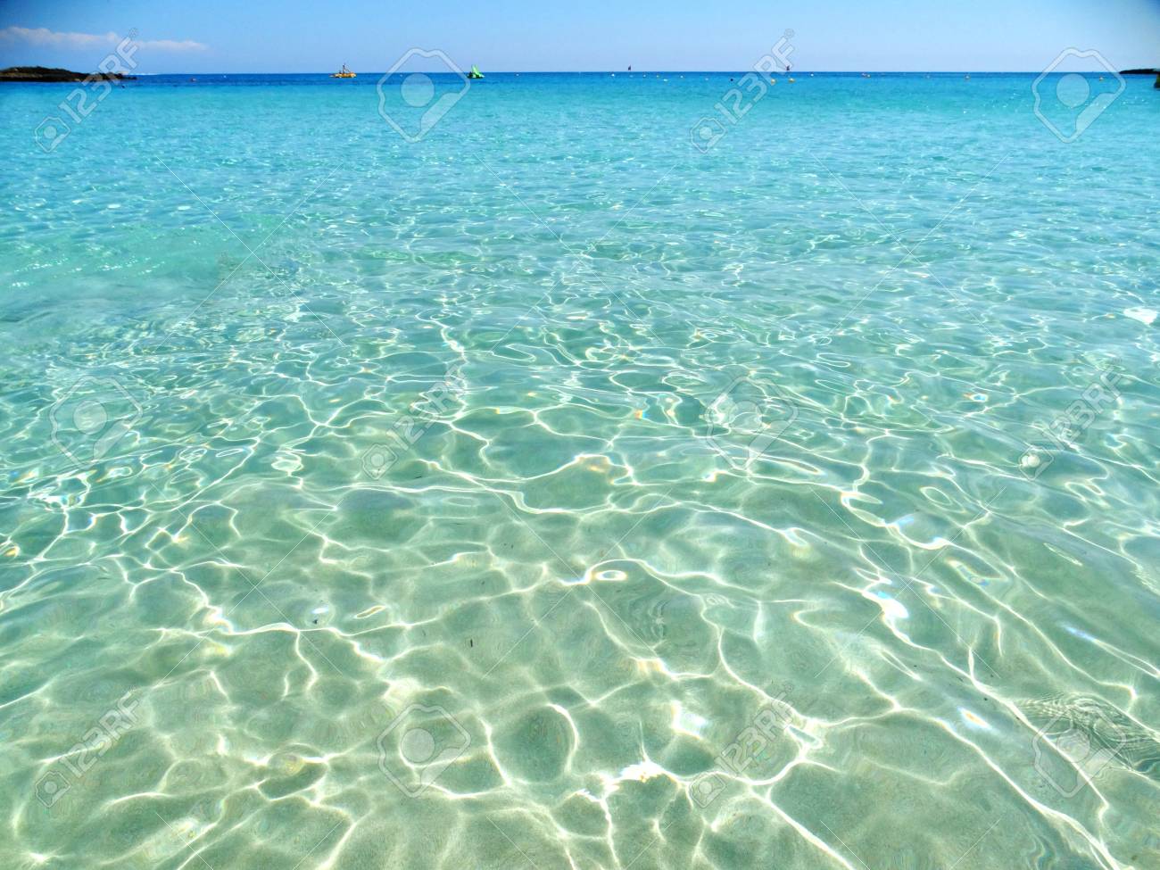 Blue Crystal Water And White Sand Summer Beach And Holiday Background With Copy Space Stock Photo Picture And Royalty Free Image Image 98044418