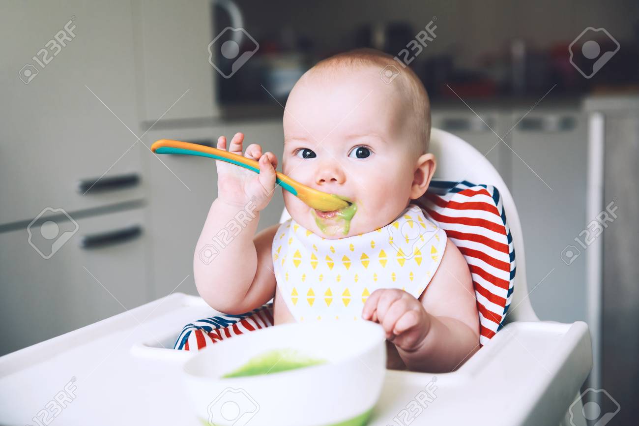 baby eating high chair
