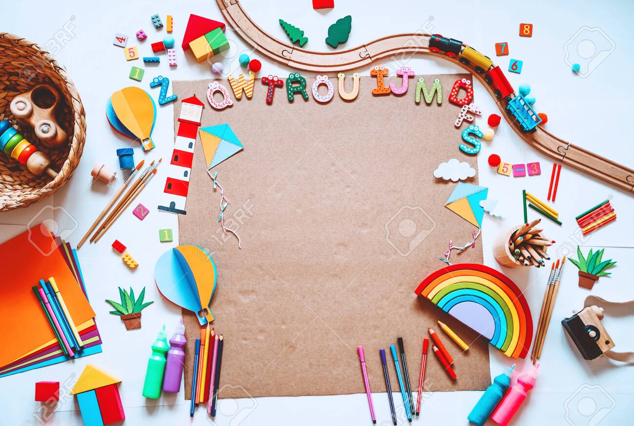 Background for preschool or kindergarten or art classes. Kids educational toys and school supplies for draw and make DIY crafts. Flat lay top view. Art child frame with empty paper, mock up for text - 131199107 Background for preschool or kindergarten or art classes. Kids educational toys and school supplies for draw and make DIY crafts. Flat lay top view. Art child frame with empty paper, mock up for text - 131199107