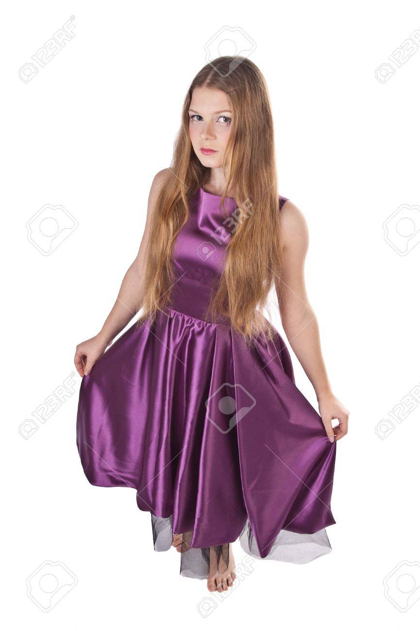 若い女の子バイオレットのイブニング ドレスを女性のおじぎ白い背景の上で の写真素材 画像素材 Image