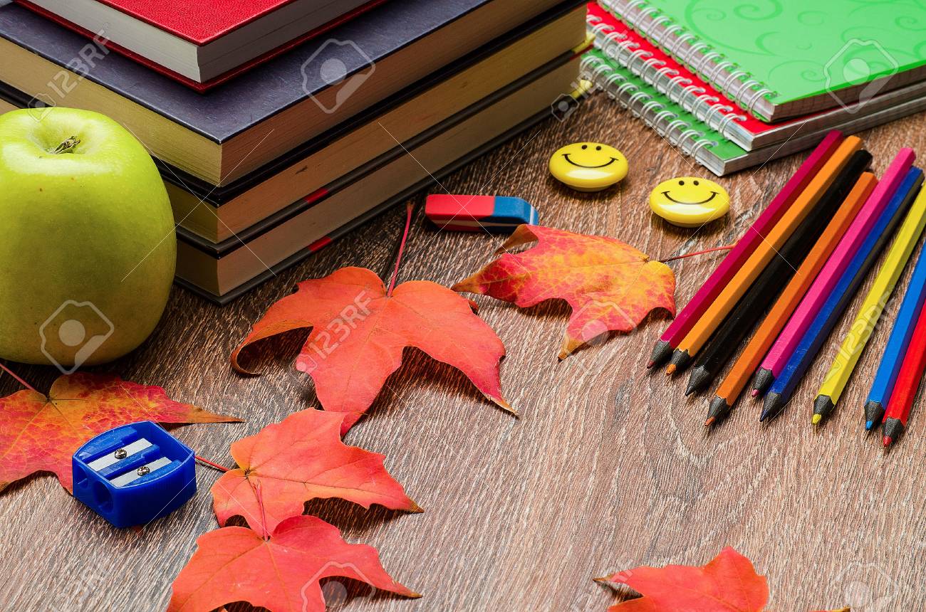 books notebooks pencils stationery green apple and autumn