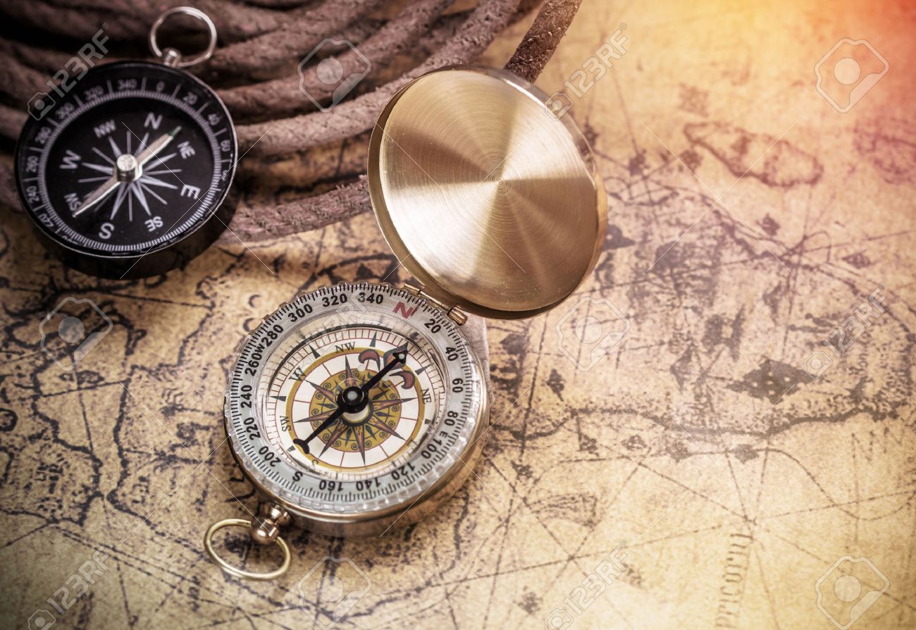 compass on vintage map with accessory to the Adventure. - 43213153 compass on vintage map with accessory to the Adventure. - 43213153