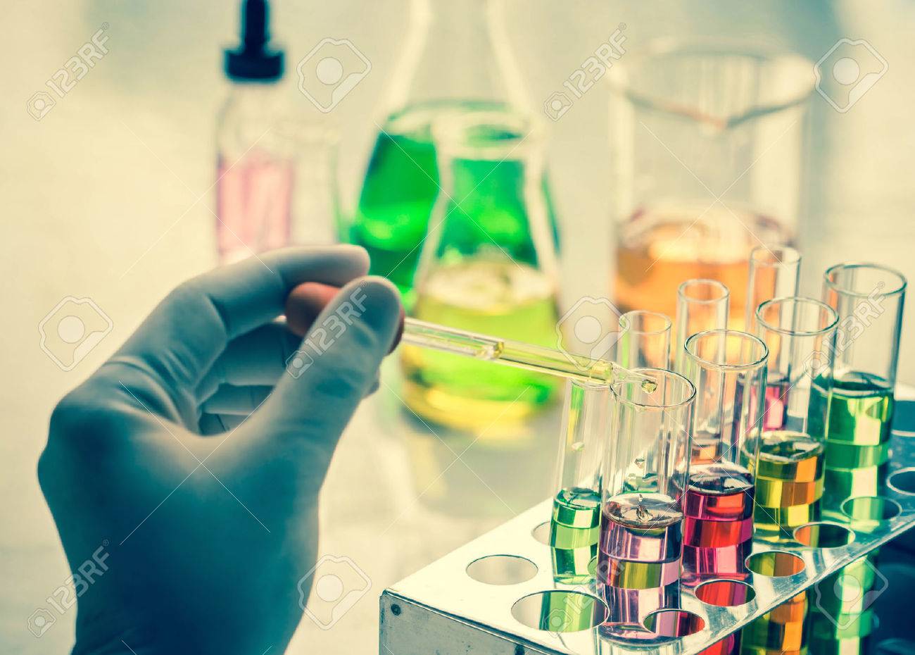 Scientist hand holding a Test tubes,Laboratory research. - 47257706 Scientist hand holding a Test tubes,Laboratory research. - 47257706