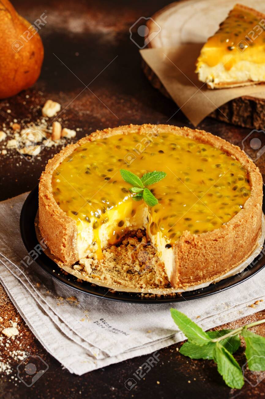 Cheese Cake With Passion Fruit On A Dark Background Cheese Cake Stock Photo Picture And Royalty Free Image Image 138282201