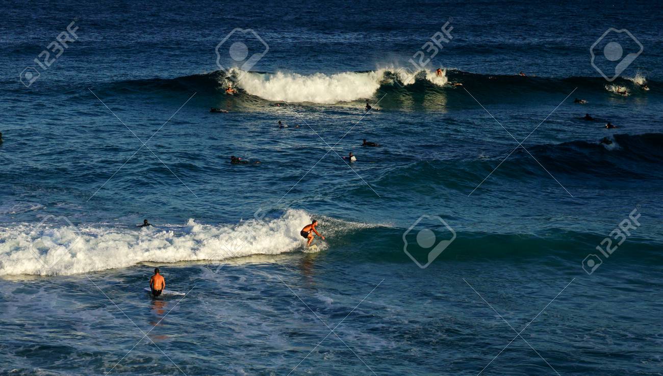 Australian Young Man And Lady Surfing At Tamarama Beach In Sydney Stock Photo Picture And Royalty Free Image Image