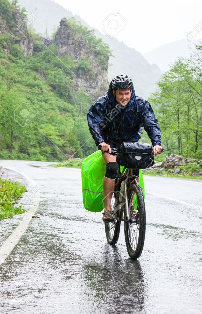 Cycle tourist on a road in Pontic Mountains of Northern Turkey - 29338665 Cycle tourist on a road in Pontic Mountains of Northern Turkey - 29338665
