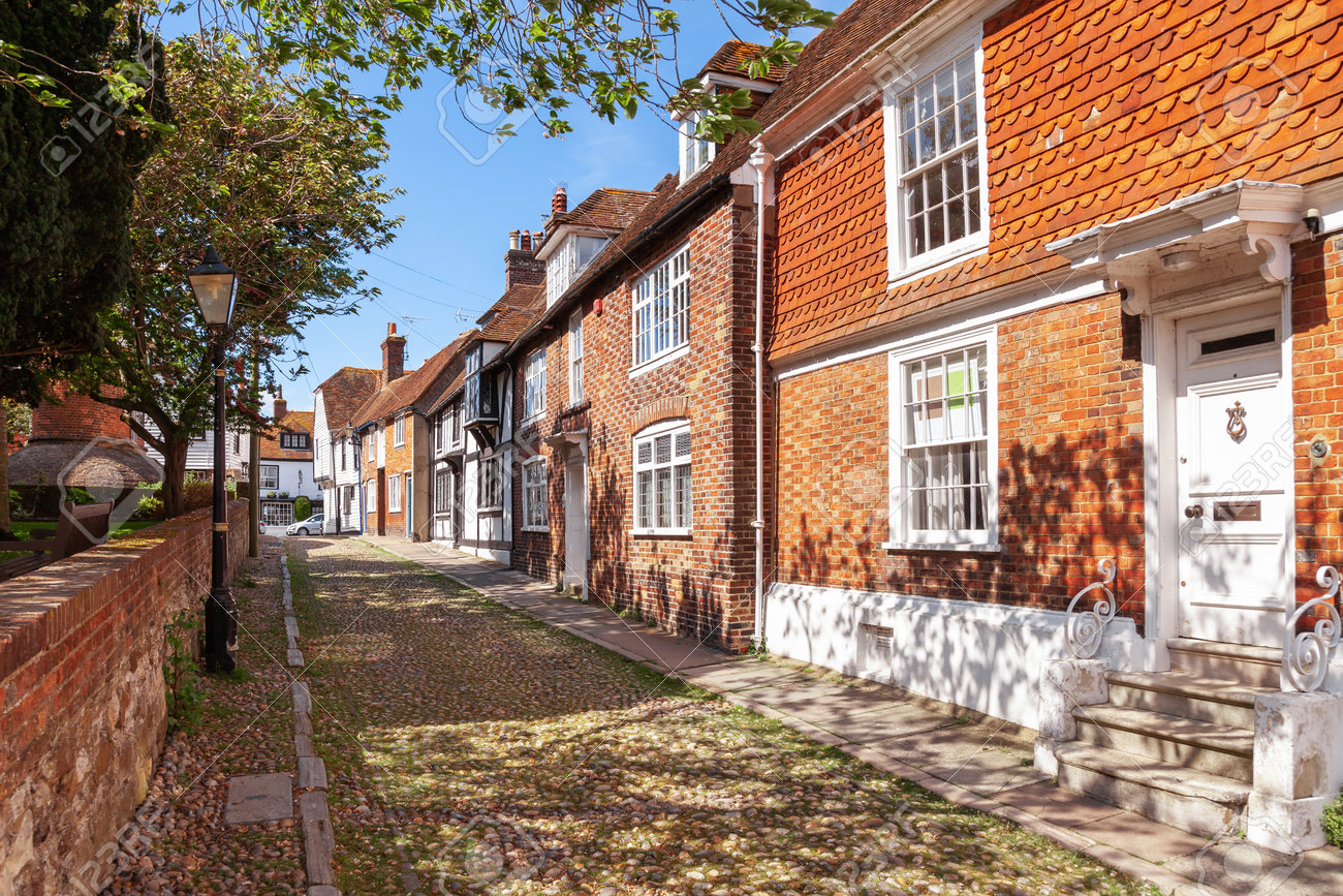 Old timber-framed and brick english houses along cobblestone street in picturesque Rye town, a popular travel destination in East Sussex, England, UK - 163985631 Old timber-framed and brick english houses along cobblestone street in picturesque Rye town, a popular travel destination in East Sussex, England, UK - 163985631