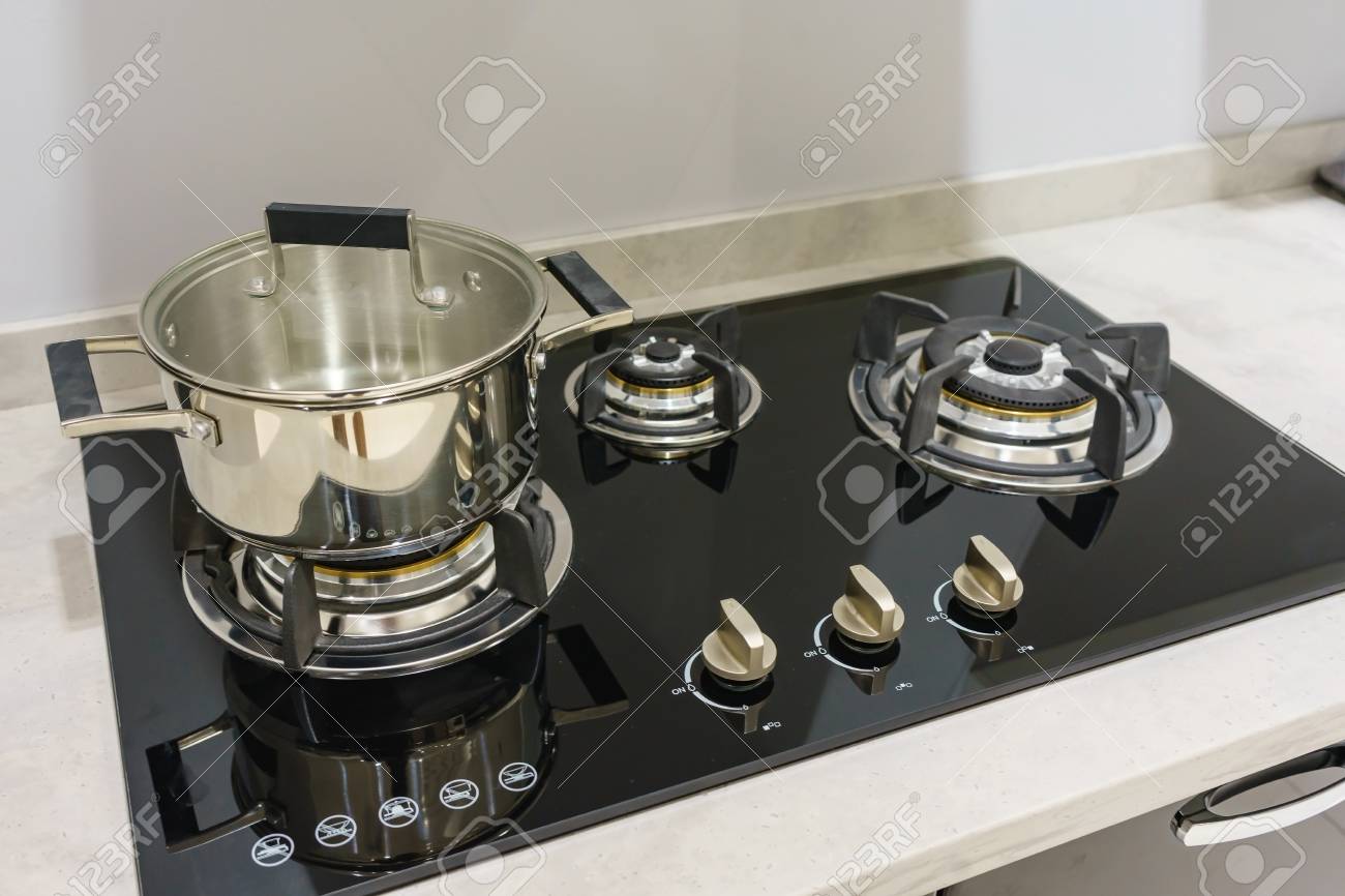 Close Up Of Stainless Steel Cooking Pot On Gas Stove In Contemporary Stock Photo Picture And Royalty Free Image Image 87798303