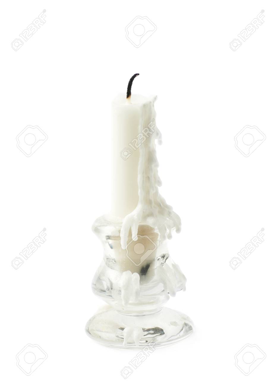 burnt white candle in a candlestick isolated over the white stock