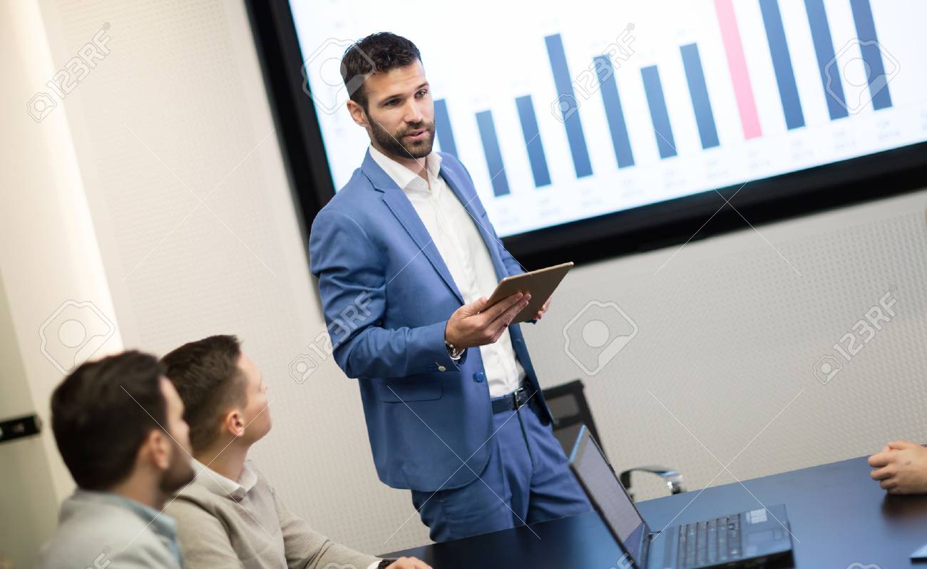 business meeting and presentation in modern conference room stock business meeting presentation