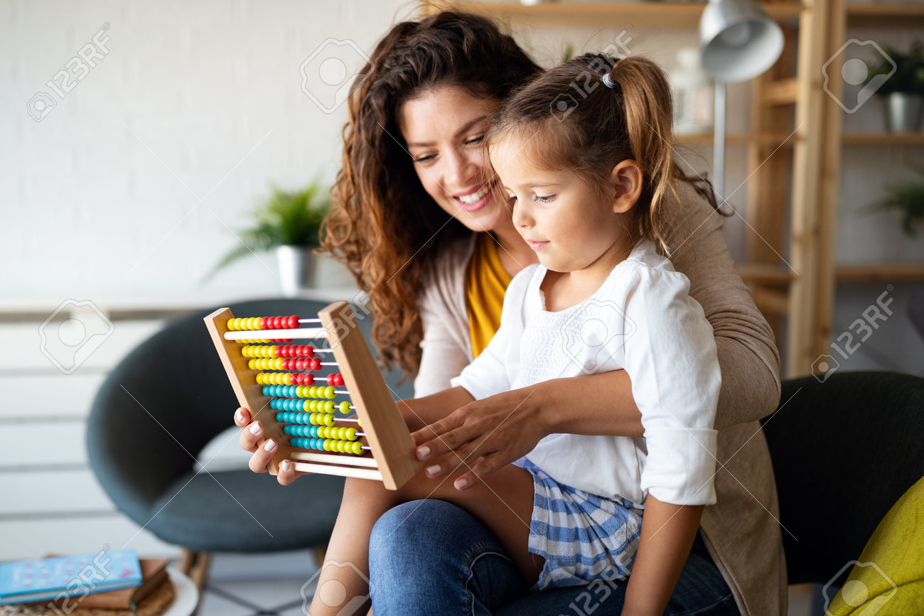 Mother and little cute girl, kid playing with abacus, early education - 166040045 Mother and little cute girl, kid playing with abacus, early education - 166040045