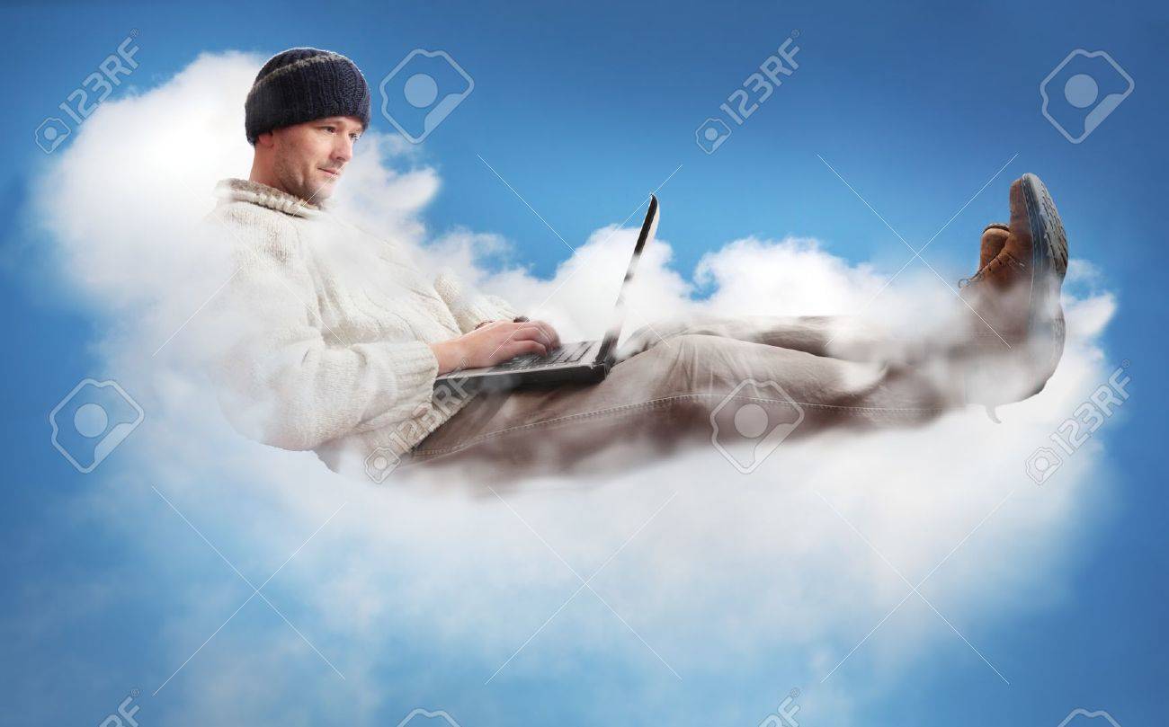 A man on a cloud operating a laptop. The man is dressed casually to represent the majority of IT workers. The concept is Cloud Computing - software/computing in the cloud. - 12376149 A man on a cloud operating a laptop. The man is dressed casually to represent the majority of IT workers. The concept is Cloud Computing - software/computing in the cloud. - 12376149