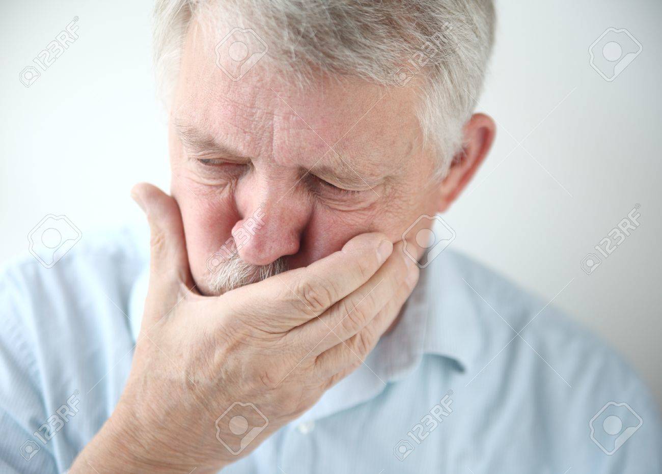senior man holds his
