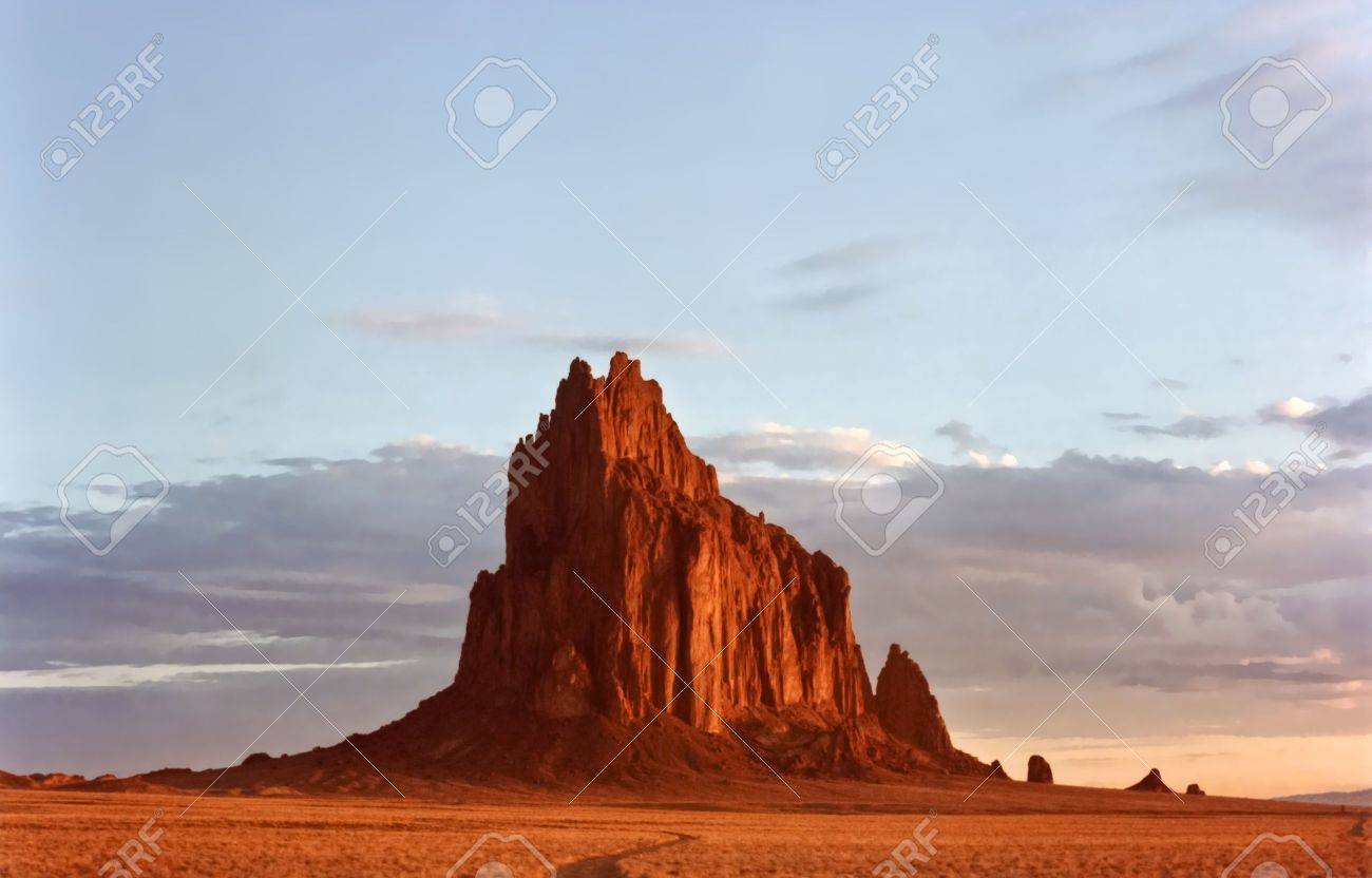 A Fery Shiprock, New Mexico, Rises From the Desert Plain Just After Dawn - 13241092 A Fery Shiprock, New Mexico, Rises From the Desert Plain Just After Dawn - 13241092