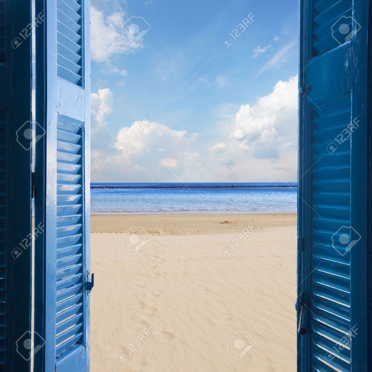 View of the Sea Mediterranean through the Open Door Stock Photo