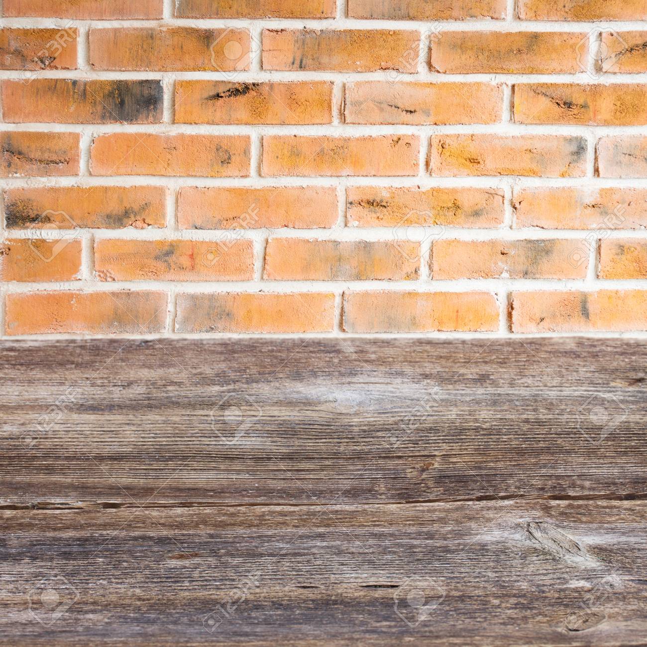 Wooden Table With Red Brick Kitchen Wall Stock Photo Picture And