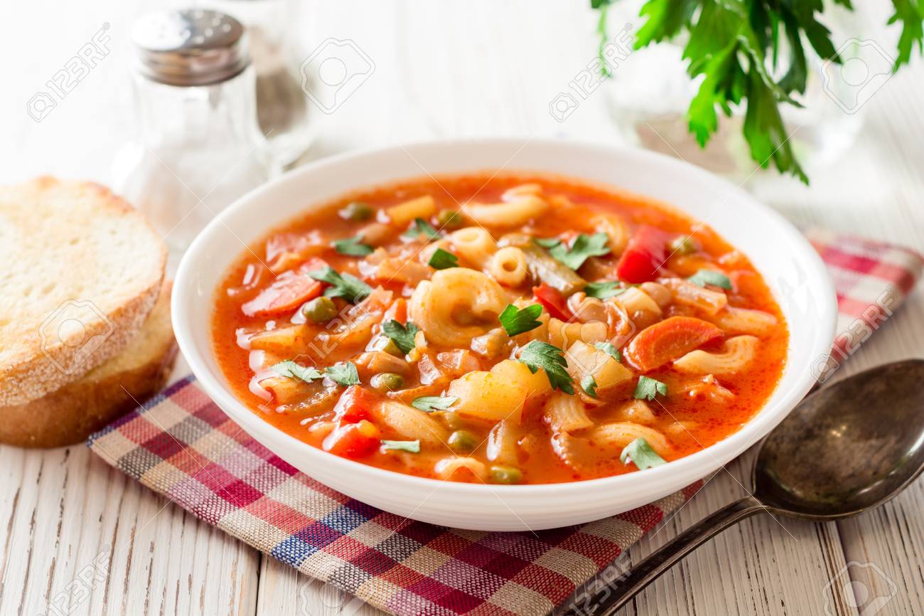 Italian minestrone soup on white wooden background. Selective focus. - 90920724 Italian minestrone soup on white wooden background. Selective focus. - 90920724