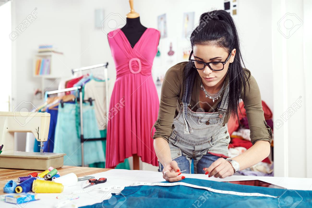 Designer drawing on a textile material - 65685425 Designer drawing on a textile material - 65685425