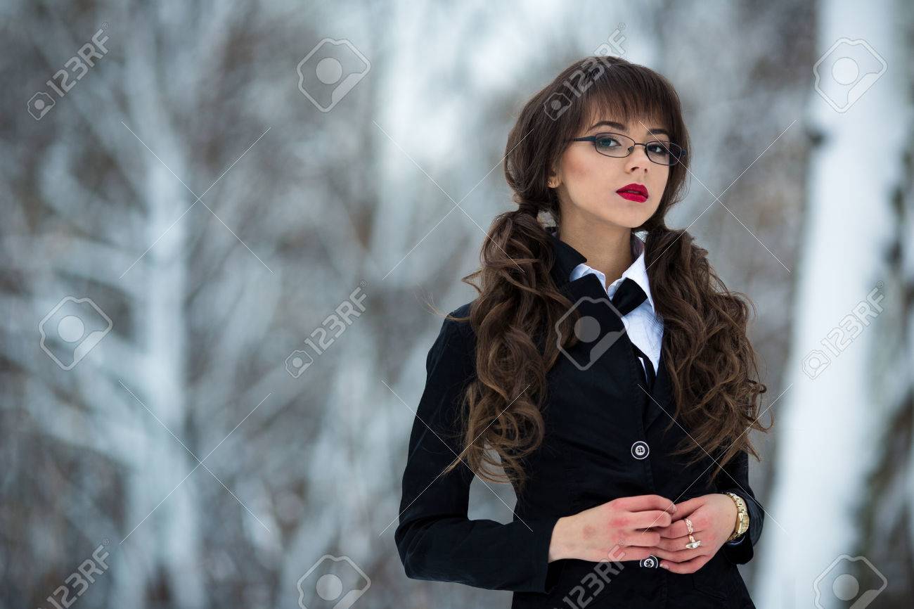 Stock Photo The Beautiful Teacher Student Teacher Schoolgirl Woman In A Suit And A Checkered Skirt Wearing Spectacles Also Looks Is Proud Forward And Stock Photo The Beautiful Teacher Student Teacher Schoolgirl Woman In A Suit And A Checkered Skirt Wearing Spectacles Also Looks Is Proud Forward And