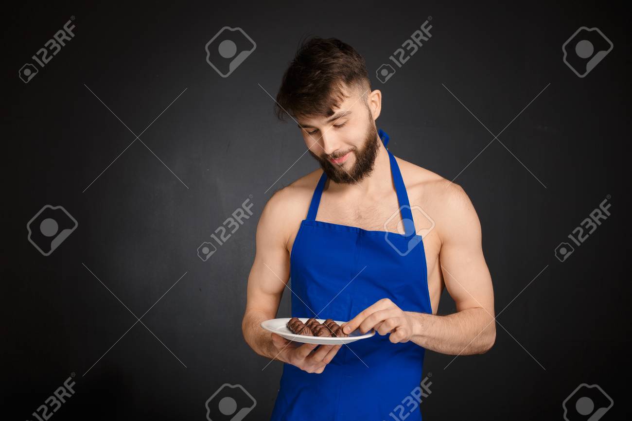 74624865-hot-sexy-naked-handsome-man-with-chocolates-chocolate-candies-smiling-naked-handsome-man-wearing-dar.jpg