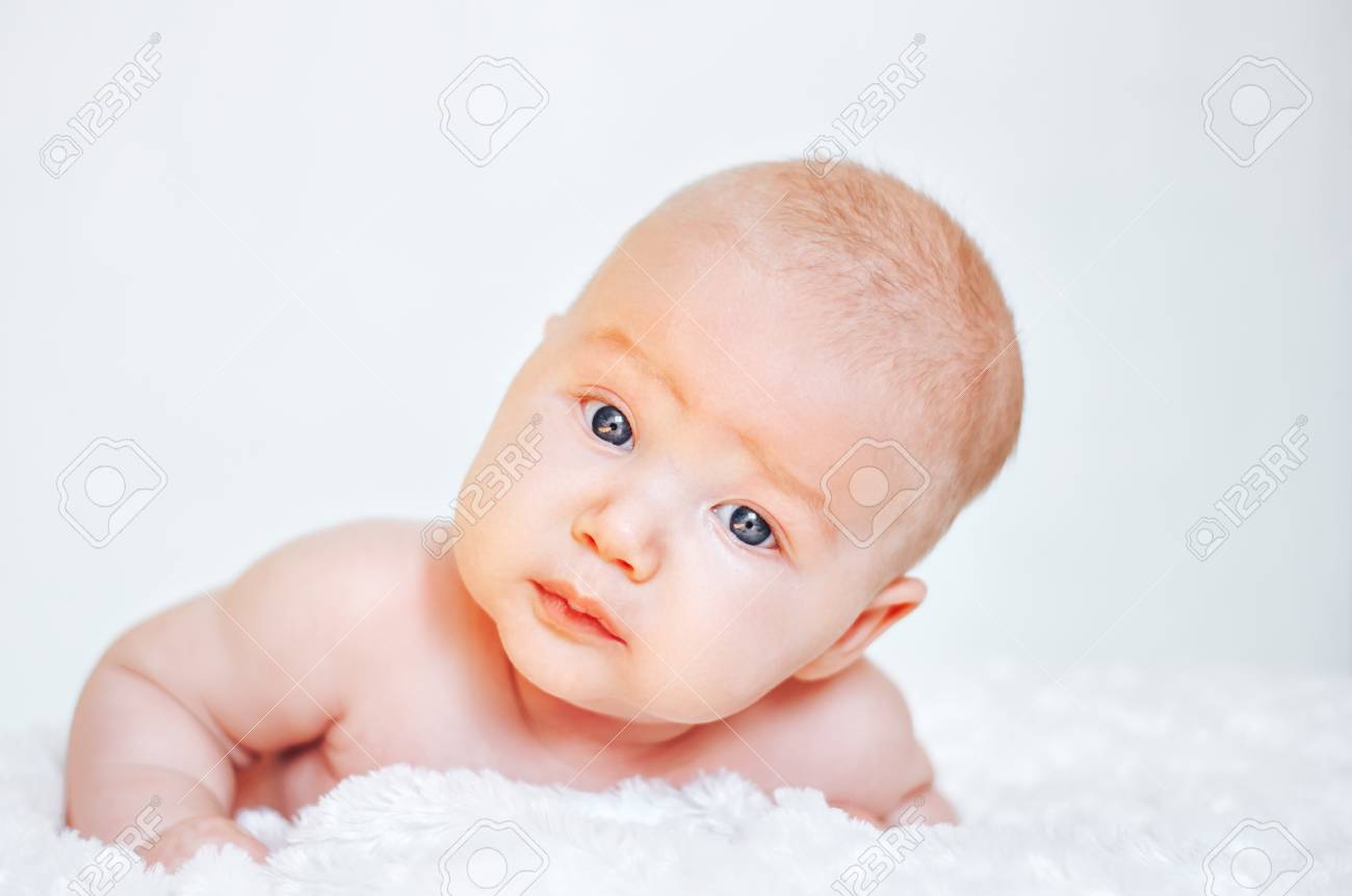 Baby, Newborn Baby Cute Blue-eyed, Blonde Hair, Baby 2 Months Without Clothes Lying On His Stomach Stock Photo, Picture And Royalty Free Image. Image 98277232. Baby, Newborn Baby Cute Blue-eyed, Blonde Hair, Baby 2 Months Without Clothes Lying On His Stomach Stock Photo, Picture And Royalty Free Image. Image 98277232.