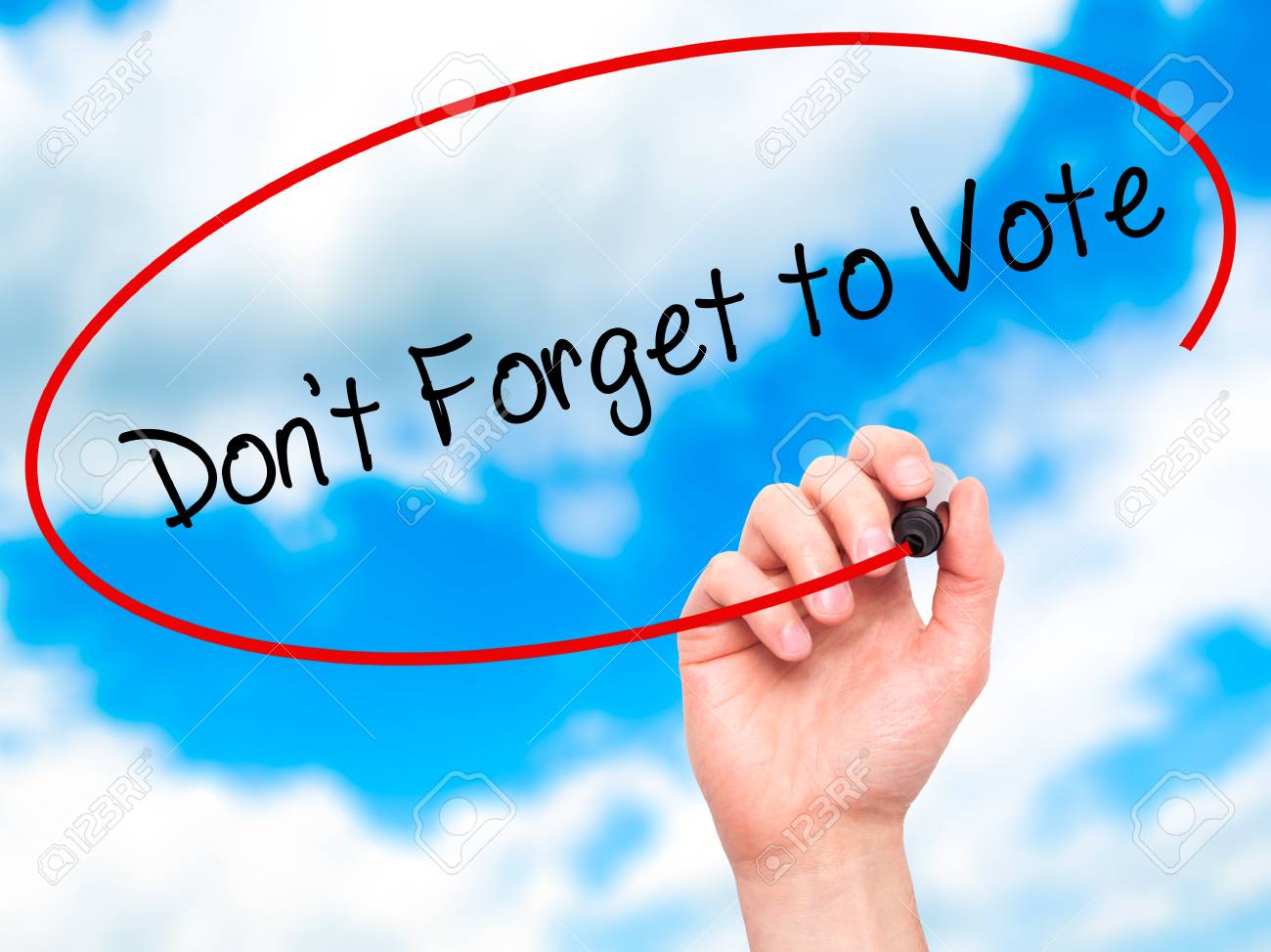 man hand writing dont forget to vote with black marker on visual don t forget to vote