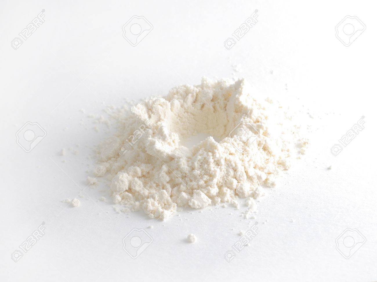 White powder with crater in center of pile - 12398009 White powder with crater in center of pile - 12398009