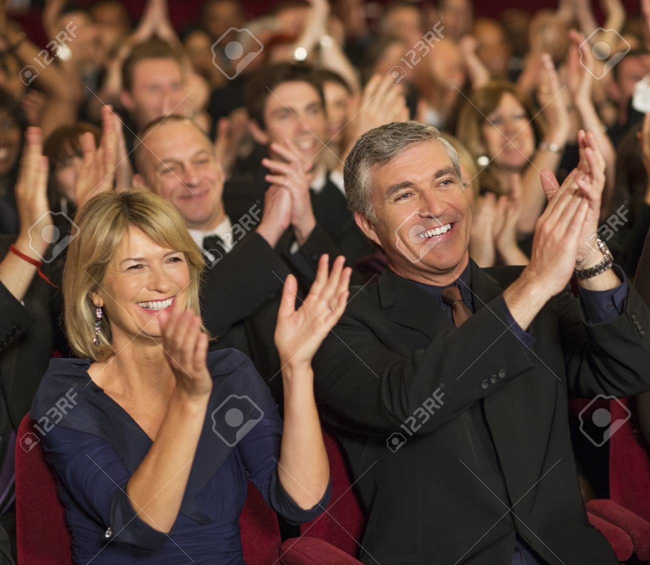 enthusiastic theater audience clapping stock photo picture and