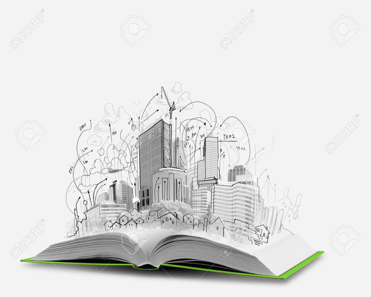 opened book and hand drawing building sketches stock photo picture
