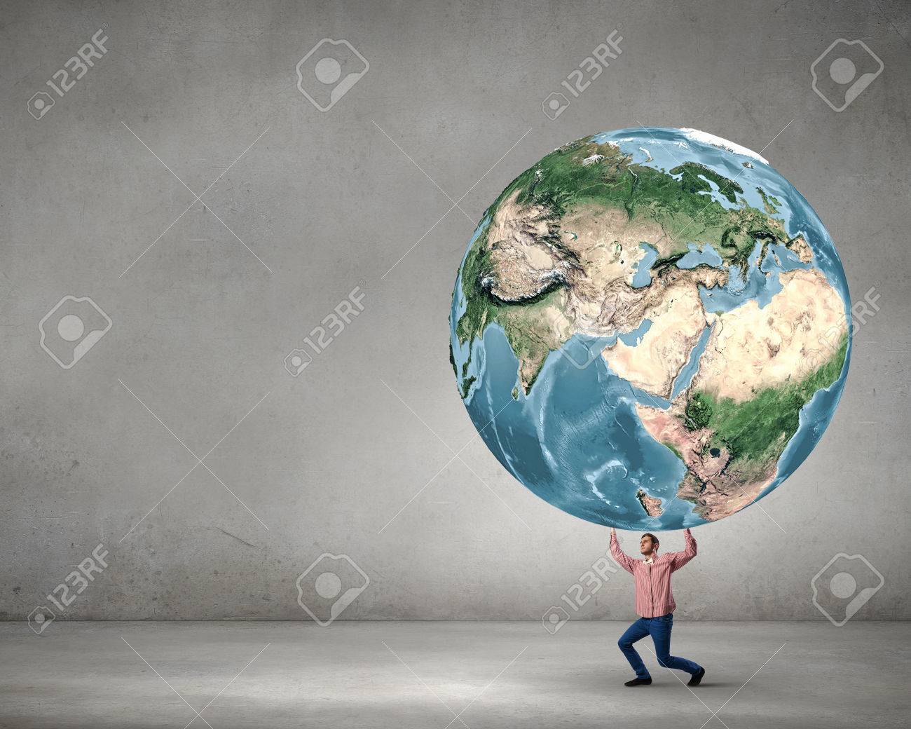 40522967-Young-man-lifting-Earth-planet-above-head-Elements-of-this-image-are-furnished-by-NASA-Stock-Photo.jpg