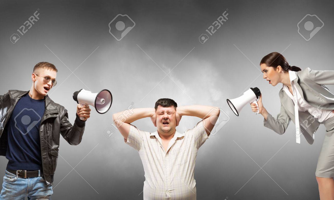 Aggressive People Screaming In Megaphone On Each Other Stock Photo, Picture  and Royalty Free Image. Image 51994558., image size:1300x780