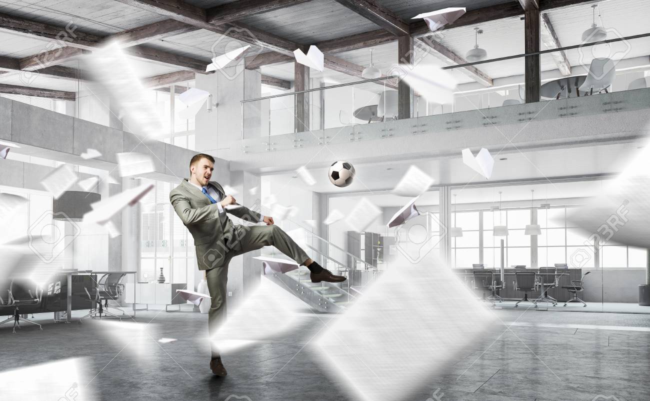 playing office soccer stock photo 79951638