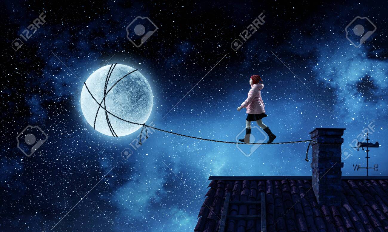 A Little Girl Walks On A Beautiful Full Moon Night Stock Photo Picture And Royalty Free Image Image 142281933