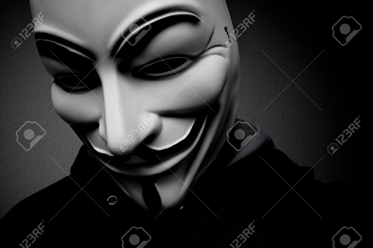 Paris - France - 18 January 2015 - man wearing Vendetta mask. This mask is a well-known symbol for the online hacktivist group Anonymous - 35783410 Paris - France - 18 January 2015 - man wearing Vendetta mask. This mask is a well-known symbol for the online hacktivist group Anonymous - 35783410