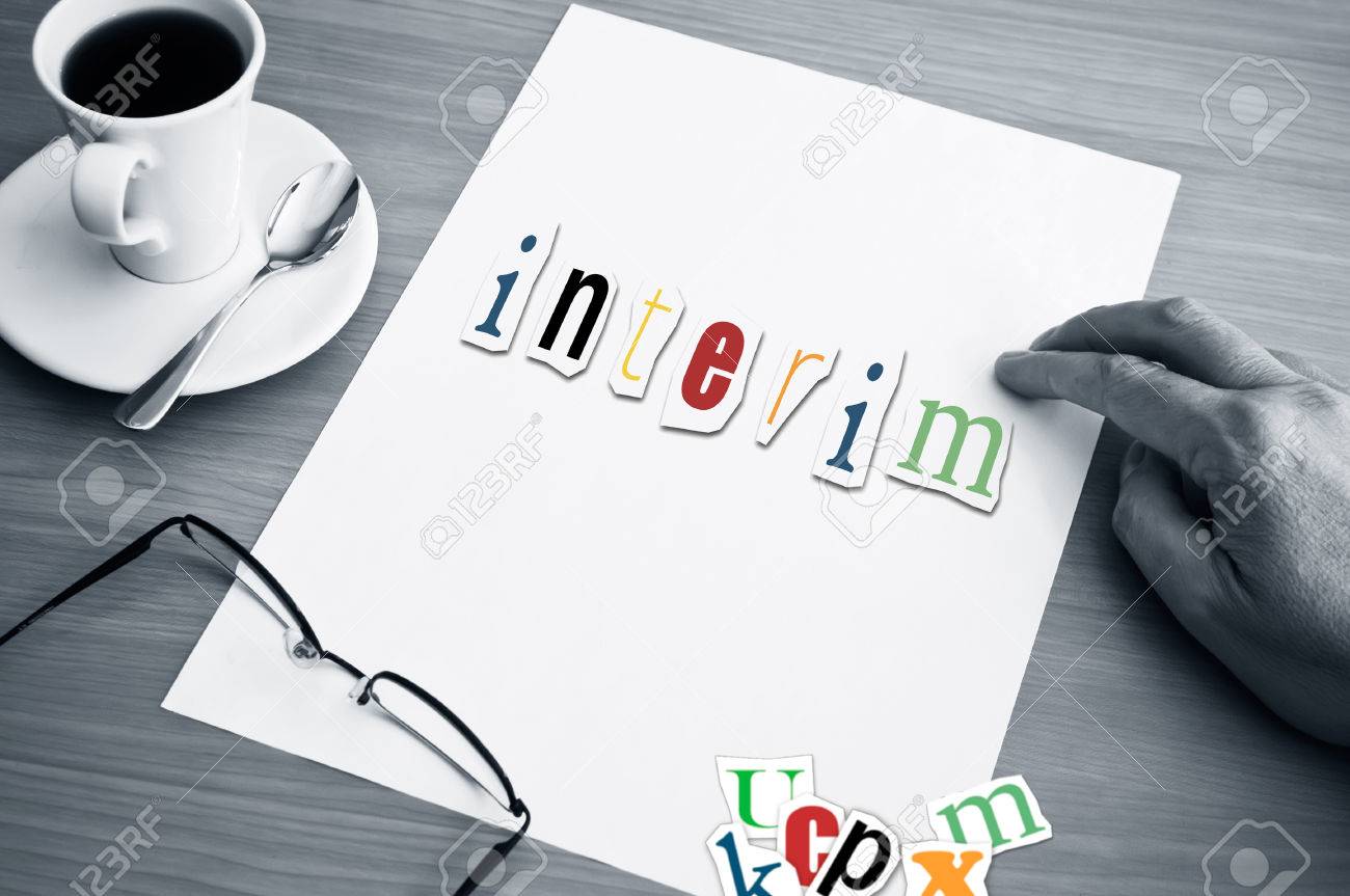 concept office cup of coffee and word interim on white page - 40971708 concept office cup of coffee and word interim on white page - 40971708