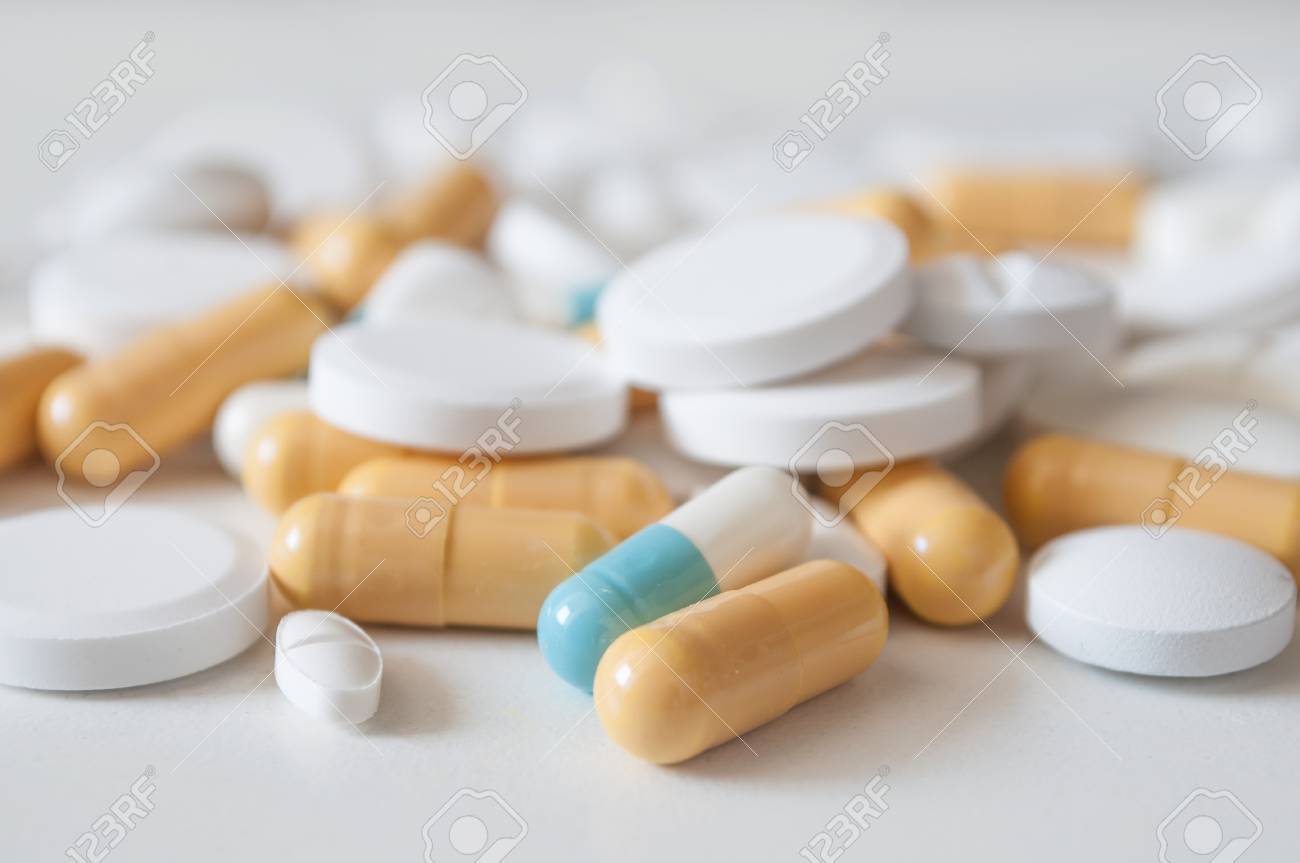 closeup of capsules and drug tablets on white background - 88332204 closeup of capsules and drug tablets on white background - 88332204