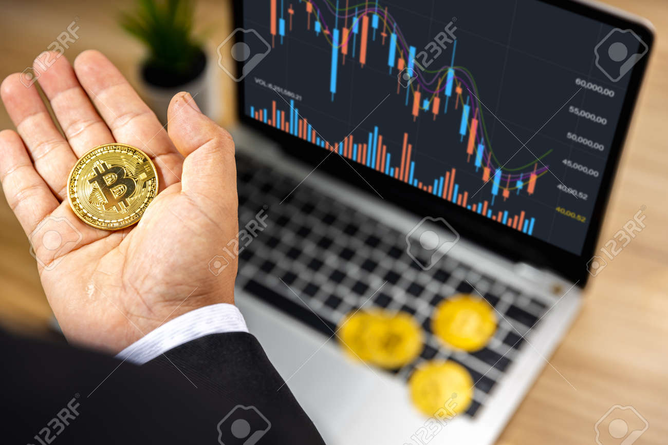 Business Bitcoin With Graph Chart Stock Photo, Picture and Royalty Free  Image. Image 171344614.