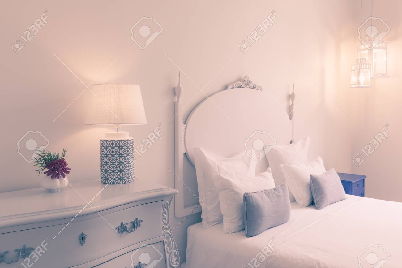 Elegant Fancy White Bedroom With Double Bed Lamp Flower Stock Photo Picture And Royalty Free Image Image 99604513