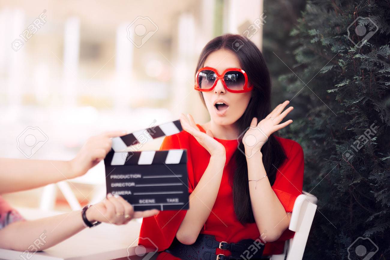 Surprised Actress with Oversized Sunglasses Shooting Movie Scene - 72727260 Surprised Actress with Oversized Sunglasses Shooting Movie Scene - 72727260
