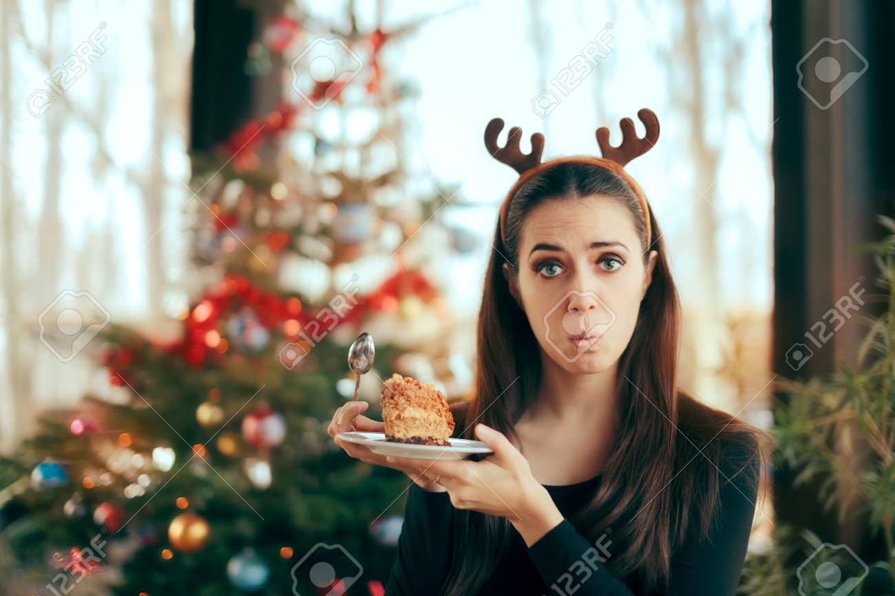Picky Girl Hating The Cake at Christmas Dinner Party - 88622432 Picky Girl Hating The Cake at Christmas Dinner Party - 88622432