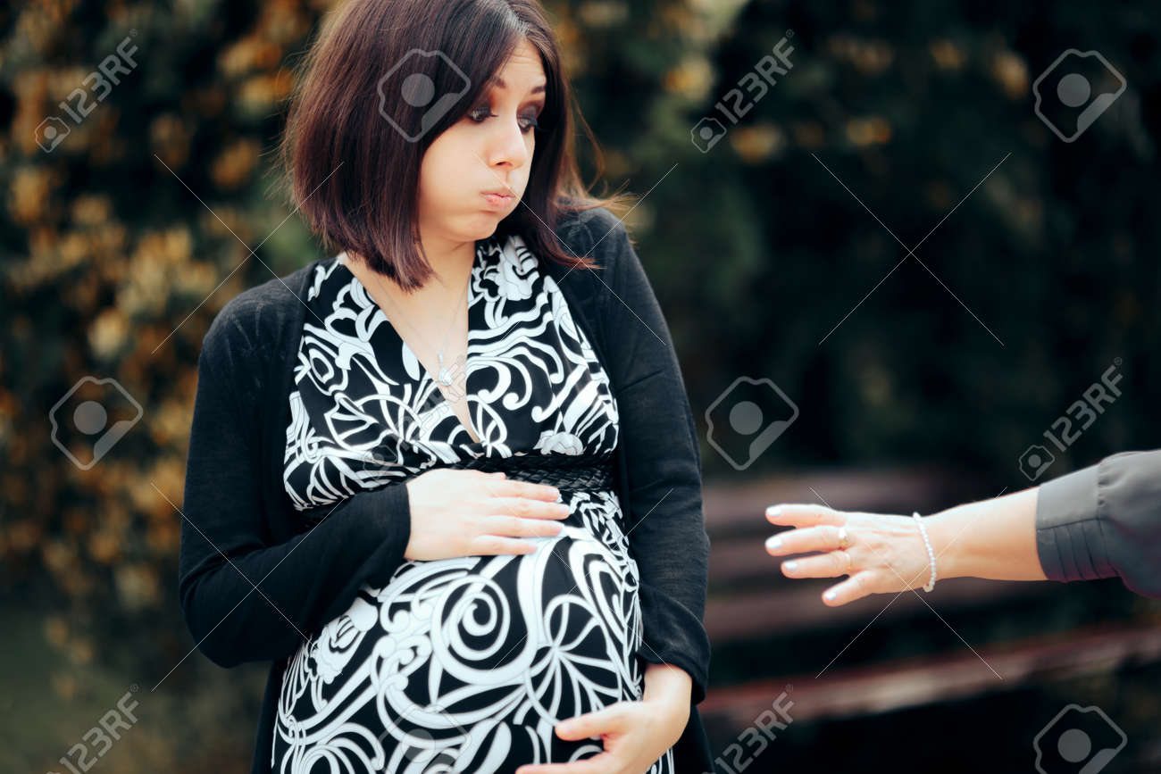 Stranger Touching Pregnant Woman Making Her Uncomfortable - 171424902 Stranger Touching Pregnant Woman Making Her Uncomfortable - 171424902