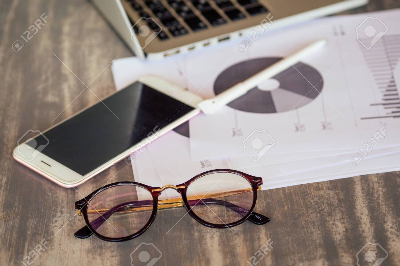 A Group Of Three Stylish Freelancing Students Entrepreneurs In Fashion Well Dressed Working Sitting At Table With Laptop In A Summer Cafe Outdoors Freelancer Distant Remote Work Surfing Surfer Stock Photo Picture